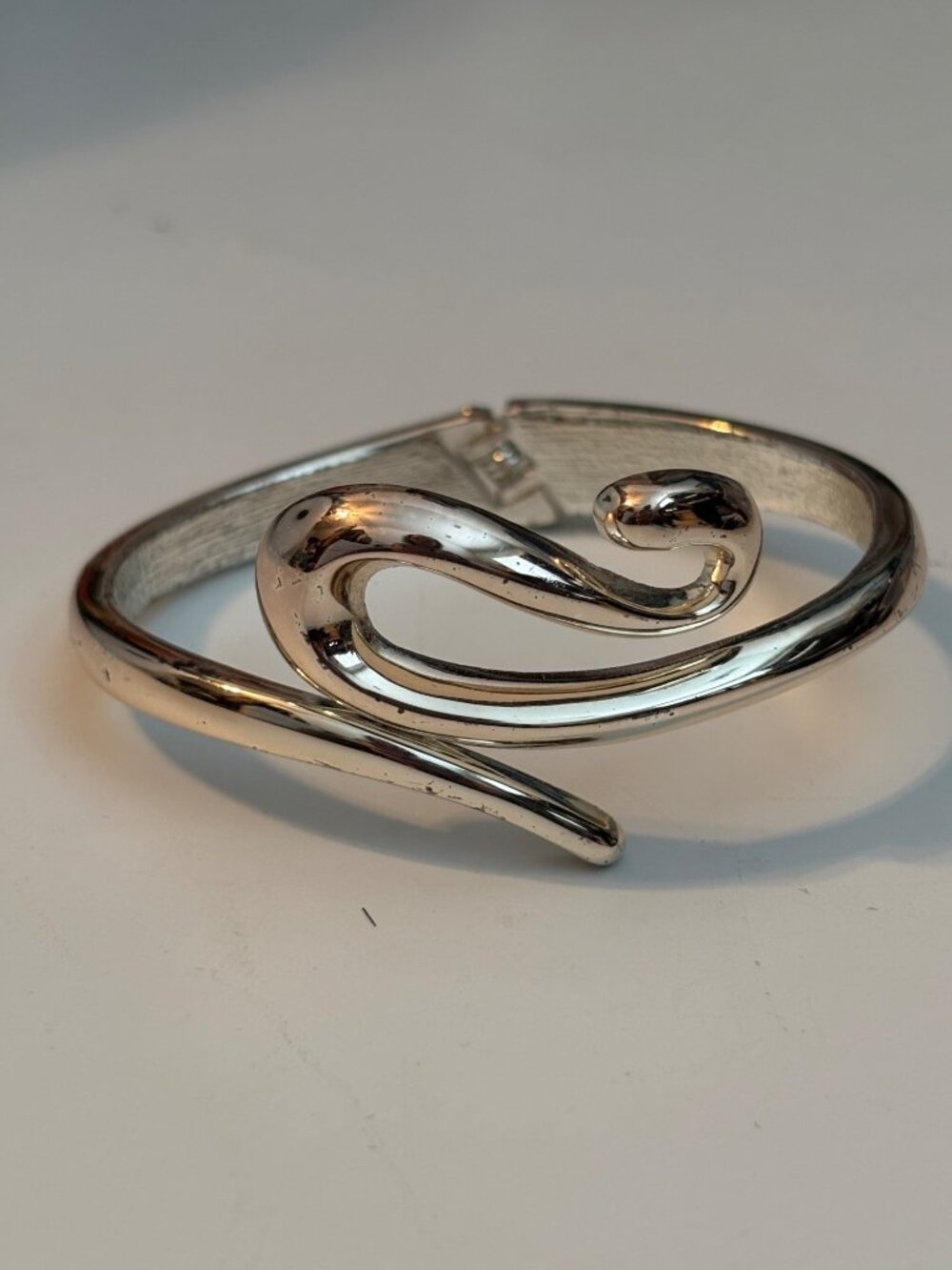 Silver-Tone Hinged Bracelet With Swirl Design